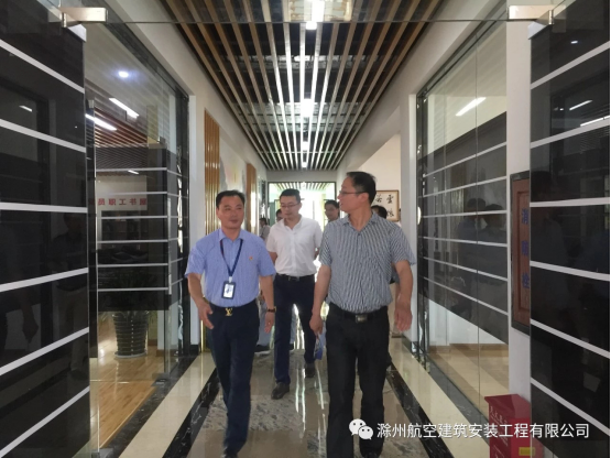 8航空建安董事长宗其龙和省委组织部城组处副处长李欣.png